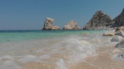 Wall Mural - rocky beach with crystal clear water