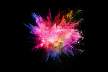 Abstract Colored Dust Explosion On A Black Background.abstract Powder Splatted Background,Freeze Motion Of Color Powder Exploding/throwing Color Powder, Multicolored Glitter Texture.