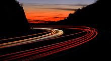 Tail Light Streaks On Highway At Night. Long Exposure.