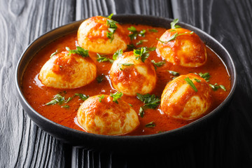 South Indian Style Egg Curry Recipe close-up in a plate. horizontal