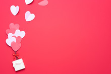 Valentine's Day Background With Red And Pink Hearts Like Balloons On Pink Background, Flat Lay