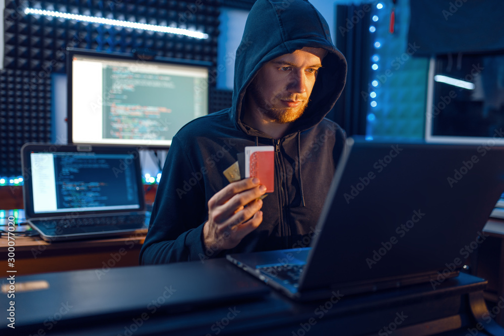 Hacker shows bank credit card, finance hacking Stock Photo | Adobe Stock