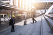 © khwanchai - officer and business people walking on stair to office
