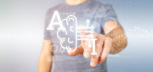 Wall Mural - business man holding artificial intelligence icon with half brain and half circuit 3d rendering