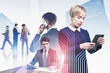 © ImageFlow - Diverse business people in city, network interface