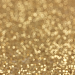 Wall Mural - gold abstract background with bokeh defocused lights