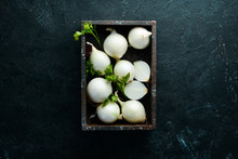 Fresh Ripe White Onions On Black Background. Top View. Free Copy Space.