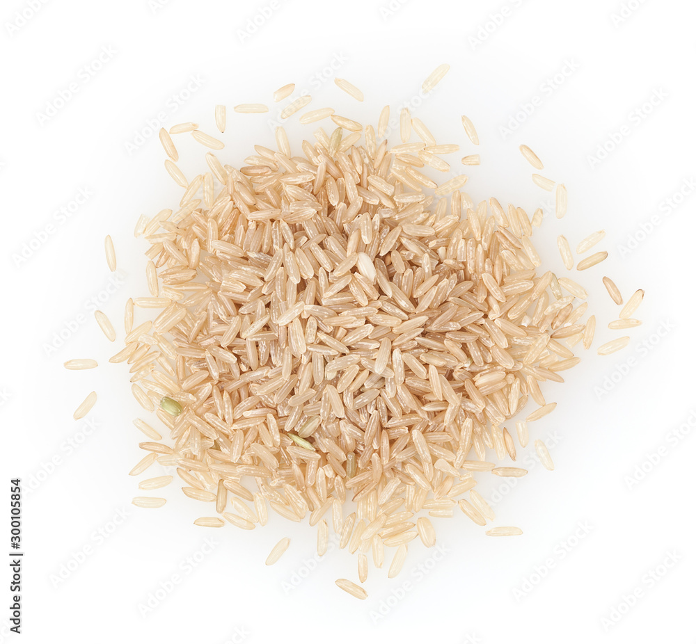 Heap of brown rice grains isolated on white background - obrazy, fototapety, plakaty 