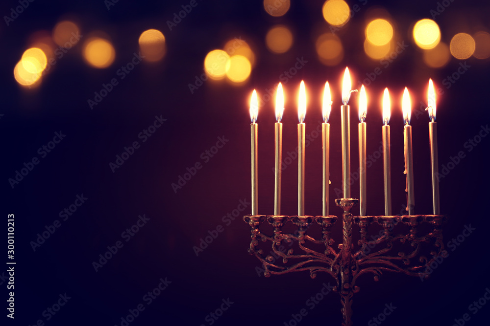 Religion image of jewish holiday Hanukkah background with menorah (traditional candelabra) and candles - obrazy, fototapety, plakaty 