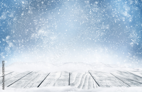 Fotomural Winter landscape with falling snow.