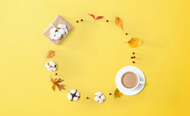 Wall Mural - Autumn theme with a cup of coffee and a gift box - overhead view