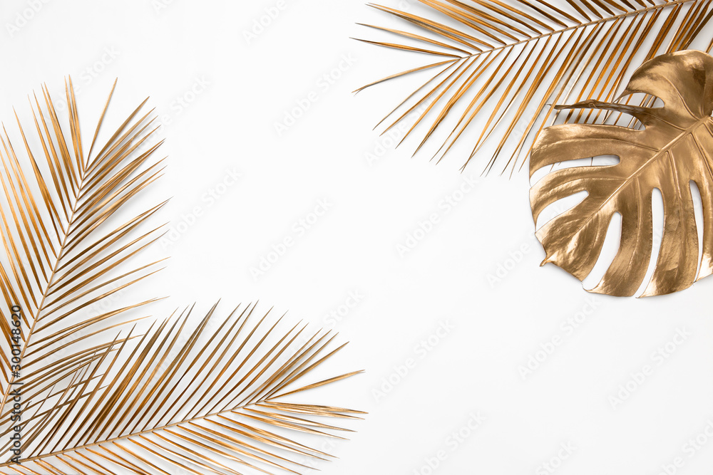 Golden tropical leaves on white background Stock Photo | Adobe Stock