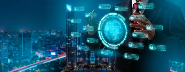 Blockchain technology concept with a chain of encrypted blocks and person in city background, financial cryptocurrency such as bitcoin.Double exposure of businessman hand working with hologram.