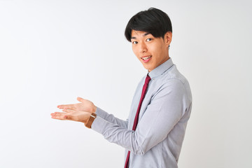 Poster - Chinese businessman wearing elegant tie standing over isolated white background pointing aside with hands open palms showing copy space, presenting advertisement smiling excited happy