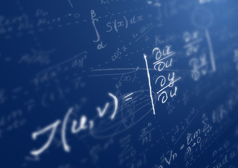 Math concept - Mathematical formulas on blue background