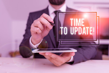 Wall Mural - conceptual hand writing showing time to update. concept meaning this is right moment to make somethi