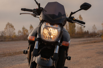 Wall Mural - One black motorcycle in the desert.