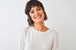 © Krakenimages.com - Young beautiful woman wearing casual t-shirt standing over isolated white background with a happy face standing and smiling with a confident smile showing teeth