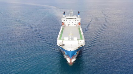 Wall Mural - Aerial follow footage of a Large RoRo (Roll on/off) Vehicle carrier vessel cruising the Mediterranean sea.