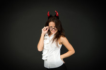 Halloween Corporate Party. Party Girl Celebrate Halloween Dark Background. Sexy Woman Wear Red Devil Horns For Halloween Party. Sensual Businesswoman With Party Look. Office Outing. Retreat