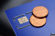 SIM Card Pre-cuted Mini, Micro, Nano Sizes And One Cent Coins.