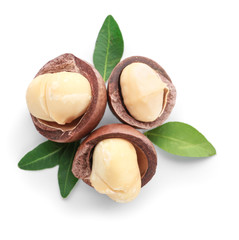 Tasty macadamia nuts on white background