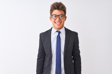 Young handsome businessman wearing suit and glasses over isolated white background with a happy and cool smile on face. Lucky person.