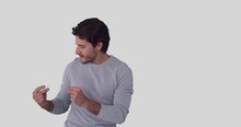 Handsome Young Man Appearing Dancing And Disappearing Over White Background