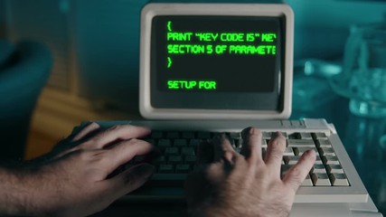 hacking or coding on a retro computer