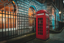 Traditional And Iconic Old Red Telephone Box In London UK.