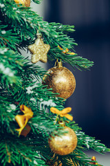 Wall Mural - Green fir tree with golden balls. Christmas wallpaper.