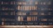 © escapejaja - blurred bookshelf Many old books in a book shop or library