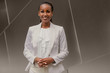 © elnariz - Classy stylish portrait of a modern african american business woman standing next to financial building