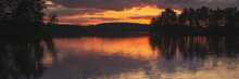 Lake At Sunset With Reflection In Finland