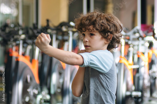 Cute Curly 7 Year Old Boy Works Out At The Gym Buy This Stock Photo And Explore Similar Images At Adobe Stock Adobe Stock