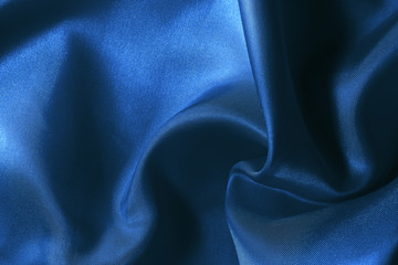Dark blue fabric cloth texture for background and design art work, beautiful pattern of silk or linen.