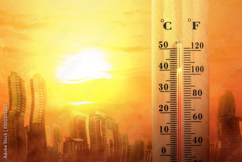 Thermometer with high temperature on the city with glowing sun background - obrazy, fototapety, plakaty 