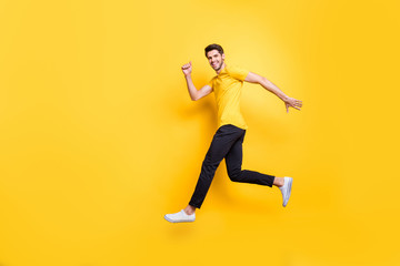 full length body size view of his he nice attractive sportive cheerful cheery guy running fast motiv