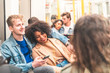 © william87 - Multiracial couple travelling by tube together