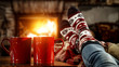 © magdal3na - Woman legs with christmas socks and fireplace in home interior.