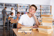 © JackF - Bored schoolboy in college library