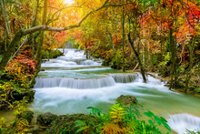 Colorful Majestic Waterfall In National Park Forest During Autumn - Image