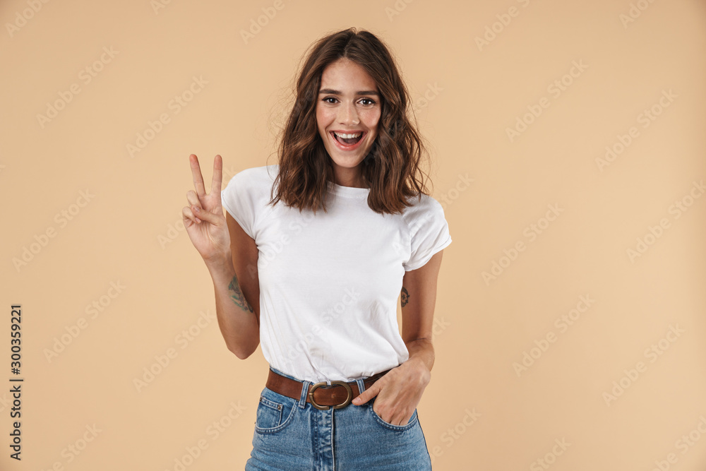Portrait of a lovely young girl wearing casual clothing - obrazy, fototapety, plakaty 