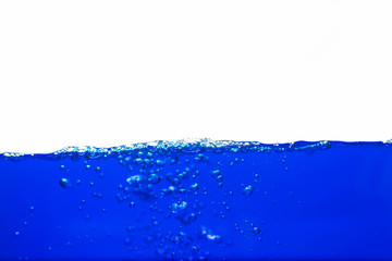 Close up blue Water splash with bubbles on white background