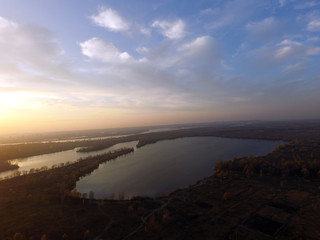 Aerial view of the saburb landscape at sunset. Dnepr river (drone image).  Near Kiev,Ukraine