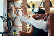 © GVS - Man wearing virtual reality goggles