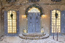 House Decorated For Christmas Outside. Vintage Courtyard Interior With Stairs, Porch, Door And Lights In Windows. Winter Christmas Background.