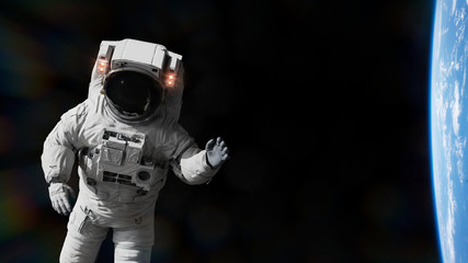 Wall Mural - astronaut performing a space above planet earth