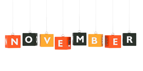 Wall Mural - november calendar background - word text on glossy colored cubes in autumn colors hanging on white b