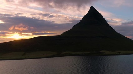 Poster - Drone video of Iceland nature Kirkjufell mountain landscape on West Iceland on the Snaefellsnes peninsula. Iceland tourist attraction and most photographed Icelandic mountain and famous icon.